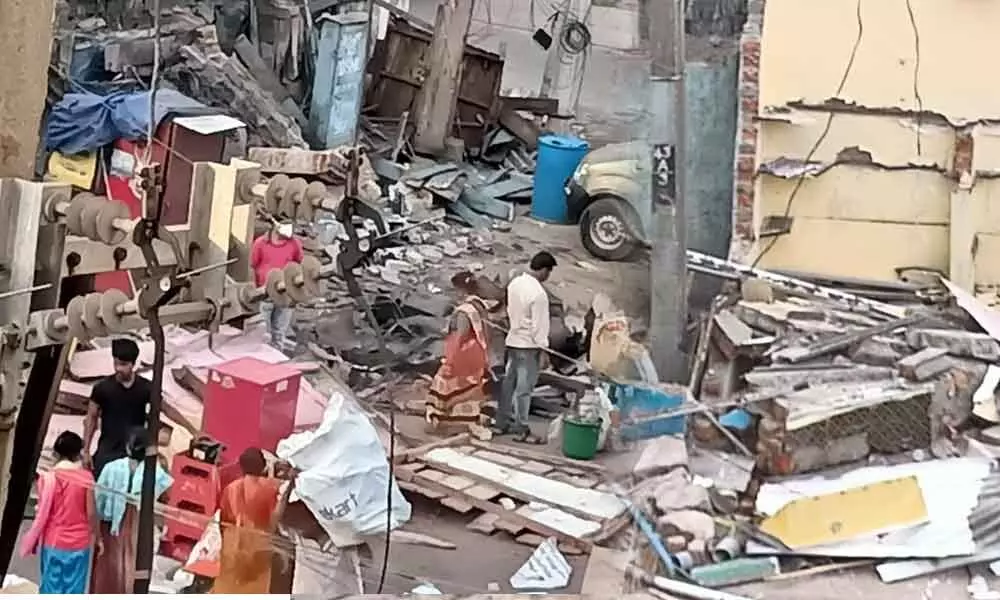 GVMC staff demolished shops in Visakhapatnam on Monday