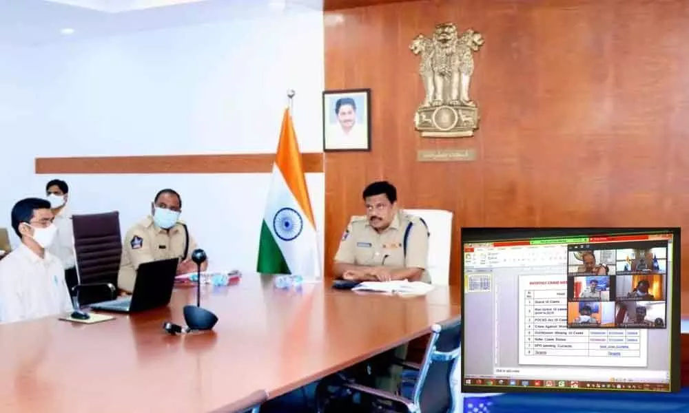 District Superintendent of Police M. Ravindranath Babu  addressing  a meeting in Kakinada on Monday