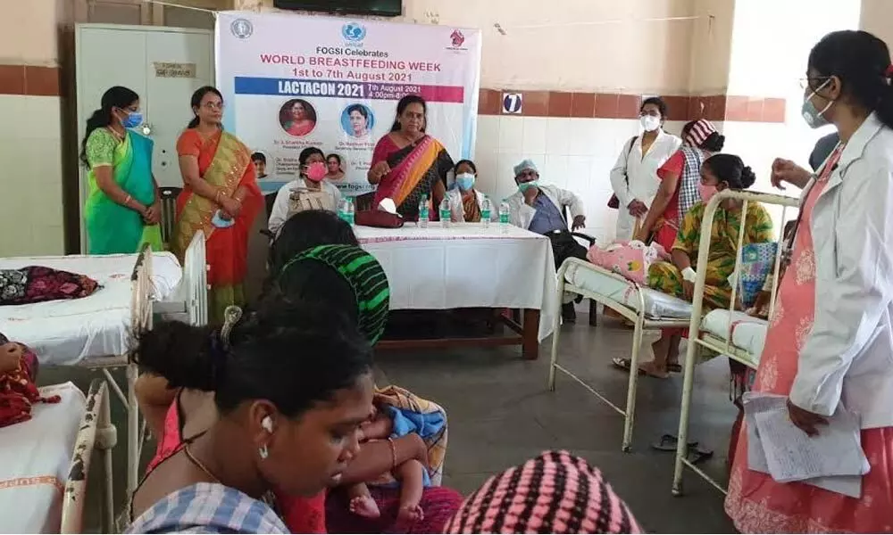 FOGSI members creating awareness on breastfeeding at KGH in Visakhapatnam on Tuesday