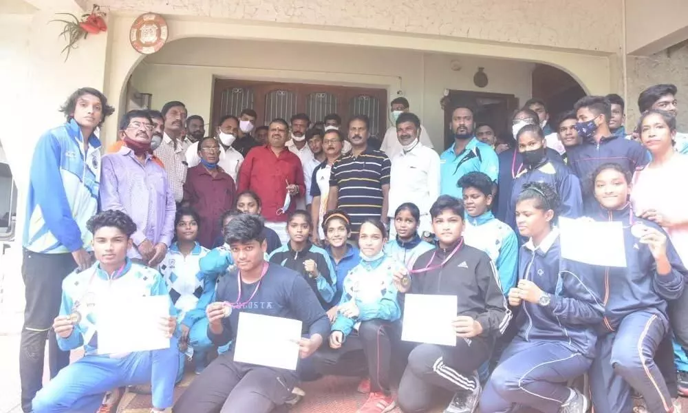 4th Junior and Youth National Boxing Championship winners with Tourism and Sports Minister Muttamsetti Srinivasa Rao in Visakhapatnam on Tuesday