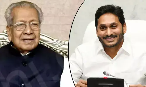 Governor Biswa Bhusan Harichandan and YS Jagan Mohan Reddy