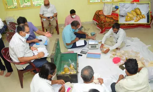 The officials counting the jewellery on Tuesday