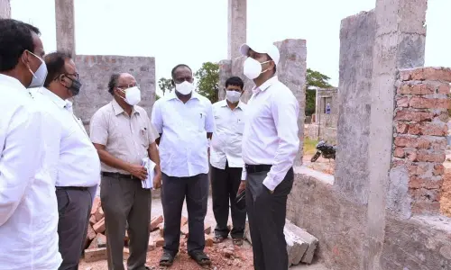 District Collector Chevuri Hari Kiran inspecting the construction of houses under Pedalandariki Illu – Navaratnalau scheme at Nemam village on Tuesday