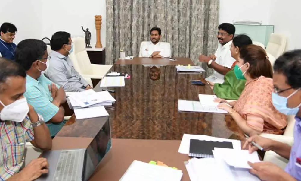 Chief Minister Y S Jagan Mohan Reddy reviews New Education Policy with officials and Education Minister A Suresh at his camp office