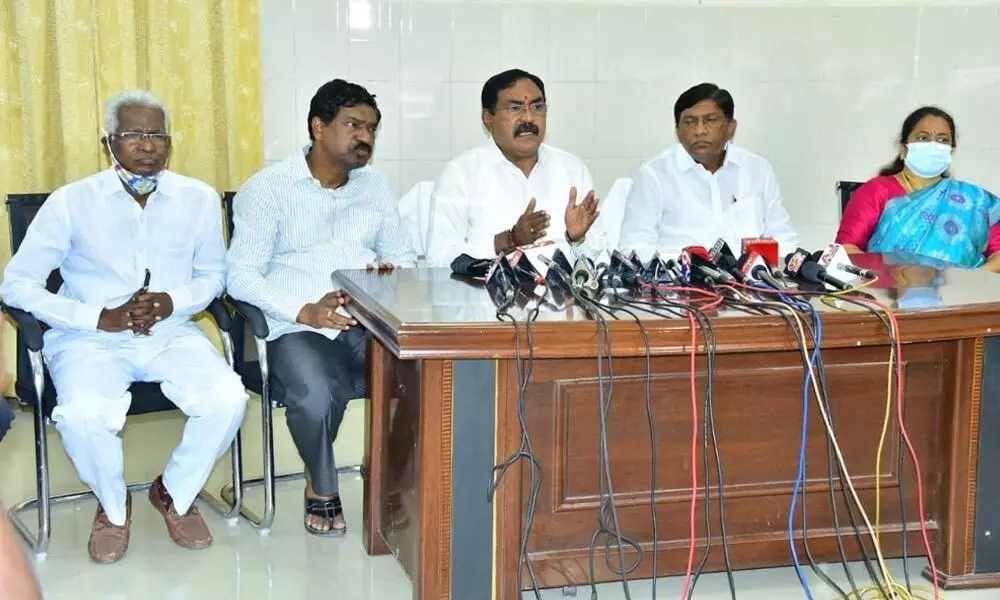 Panchayat Raj Minister Errabelli Dayakar Rao (centre) speaking to the media in Hanamkonda on Wednesday