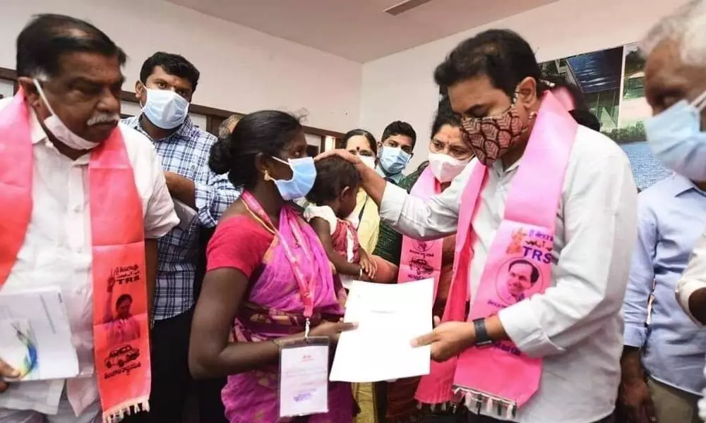 KTR gives a patient hearing to kin of deceased party workers