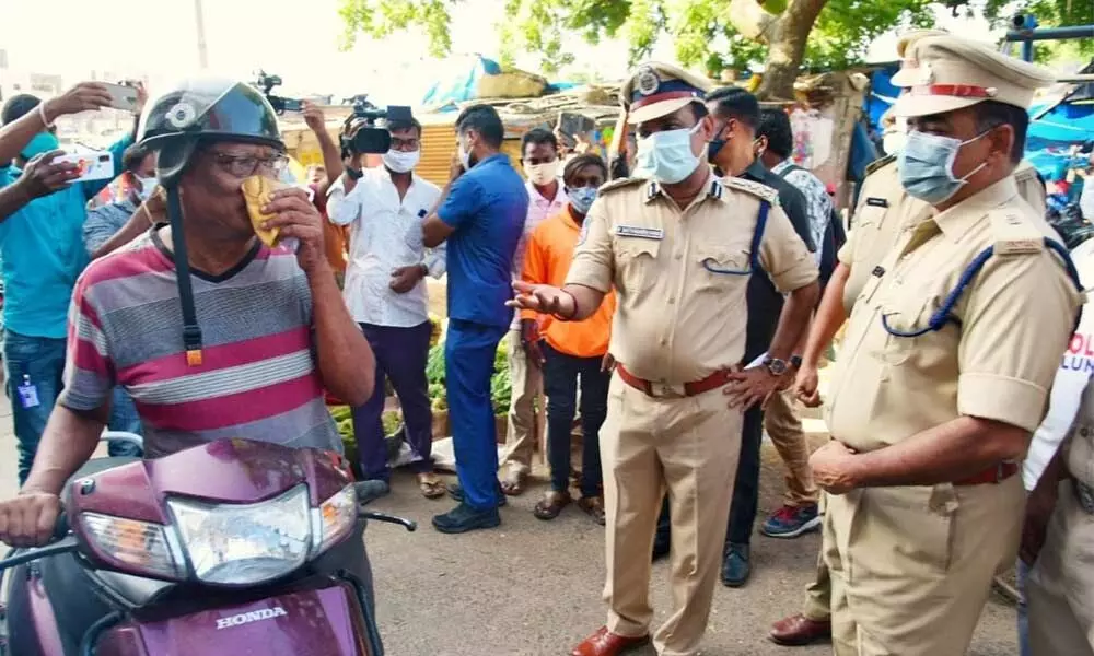 CP V Satyanarayana interacting with public in Karimnagar as part of a special drive on face masks on Wednesday