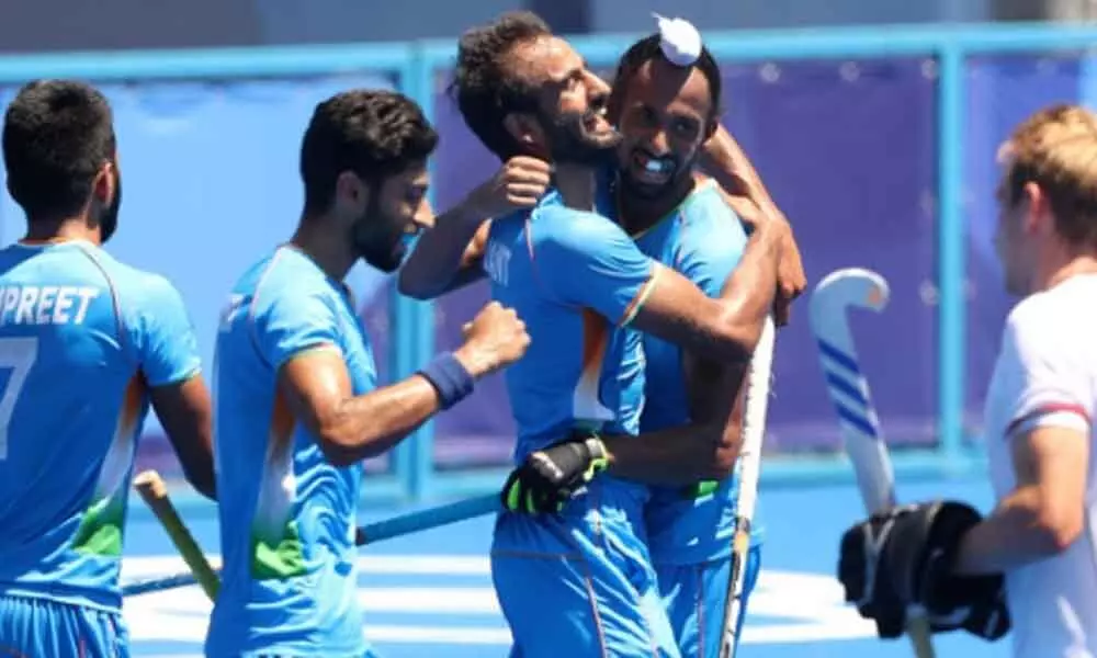 India defeated Germany 5-4 in a high-intensity goal fest to win the bronze medal in mens hockey