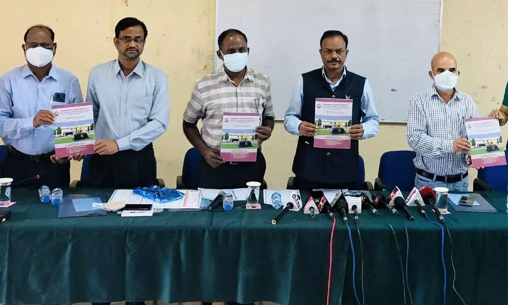 Vice-Chancellor Prof Thatikonda Ramesh (second from right) and others releasing the SDLCE brochure on Kakatiya University campus in Warangal on Thursday