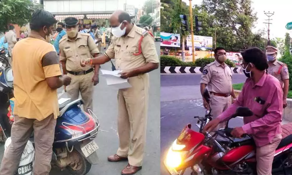 City police enforcing the curfew orders in Vijayawada on Thursday