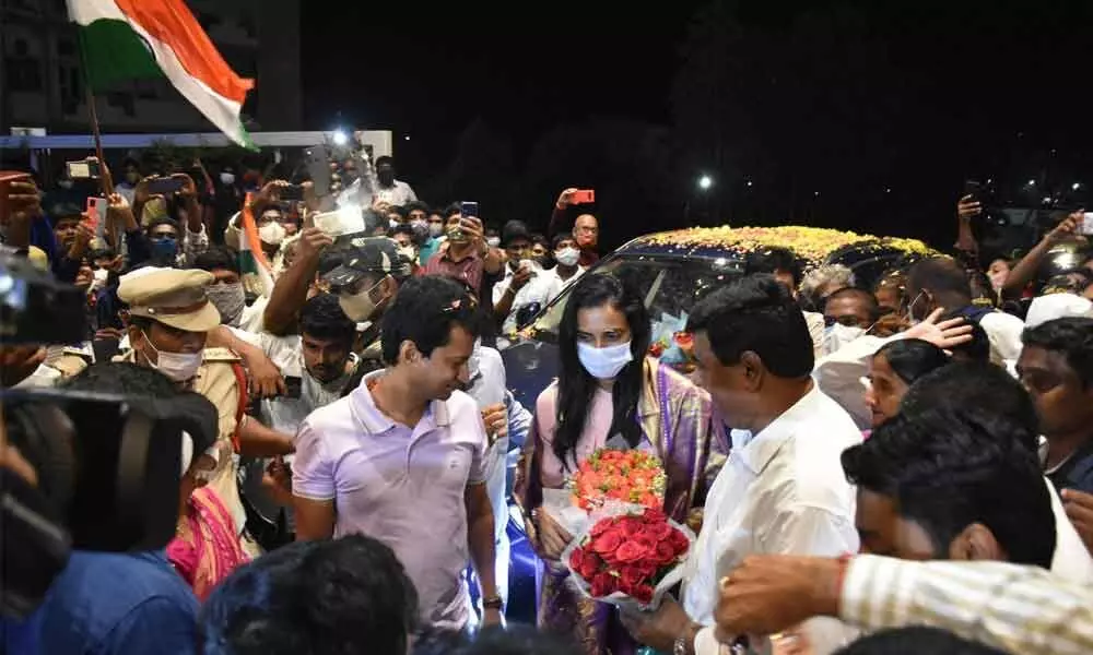 Tokyo Olympics bronze medallist P V Sindhu receives rousing welcome on her arrival at Vijayawada on Thursday