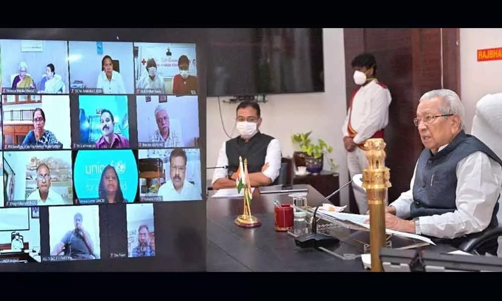Governor Biswa Bhusan Harichandan participating in the webinar on ‘Creating awareness on prevention of third wave Covid-19 in the State’ in Vijayawada