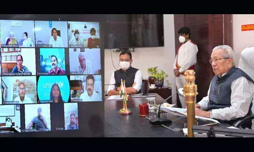 Governor Biswa Bhusan Harichandan participating in the webinar on ‘Creating awareness on prevention of third wave Covid-19 in the State’ in Vijayawada