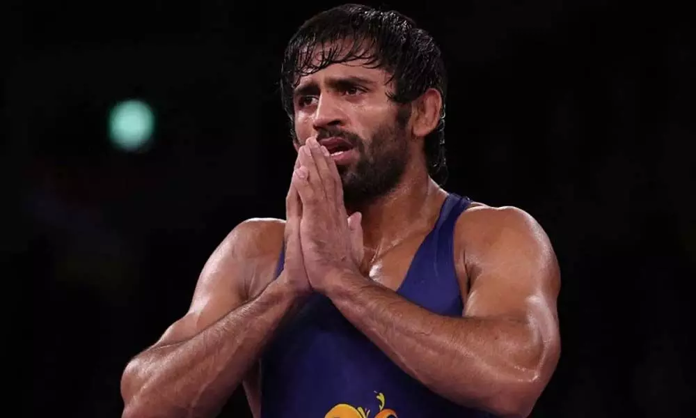 Indias Bajrang Punia bags the bronze medal in 65kg freestyle wrestling