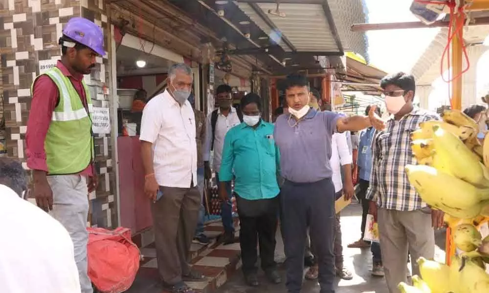 Municipal Commissioner P S Girisha inspecting the encroachments on both sides of Garuda Varadhi from Leelamahal Junction to Leprosy Hospital in Tirupati on Saturday