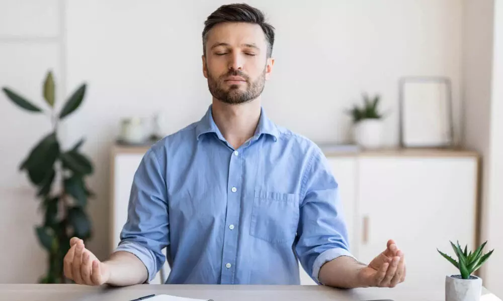 How can spirituality help manage work stress?
