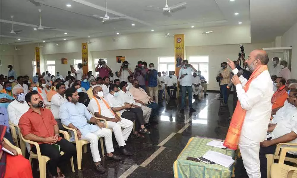 Bharatiya Janata Party Telangana chief Bandi Sanjay Kumar addressing the party activists at the BJP office at Barkatpura