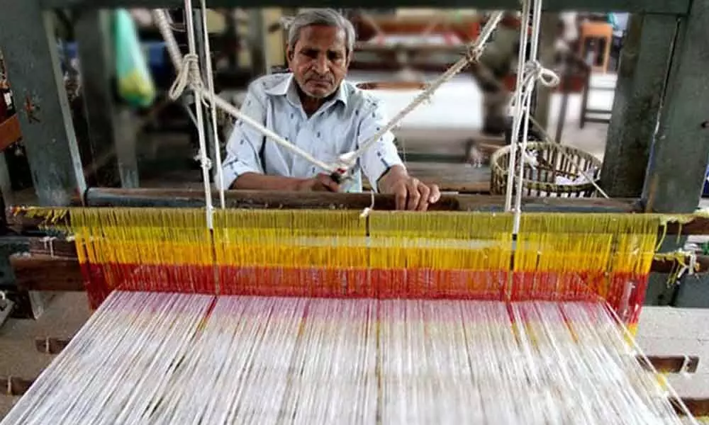 A man weaving in Dharmavaram
