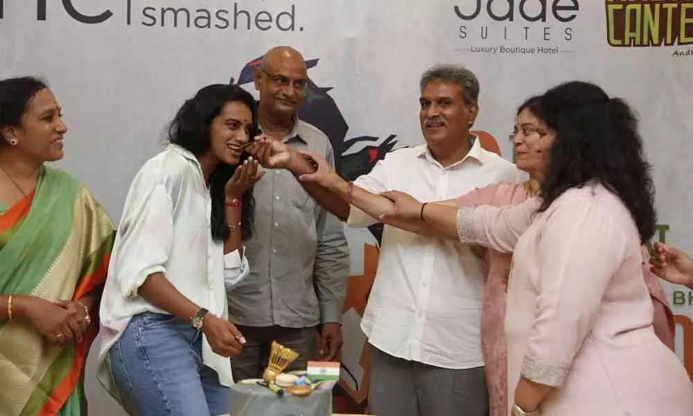 Vijayawada MP Kesineni Srinivas felicitating Olympics medal winner PV Sindhu in Vijayawada on Saturday