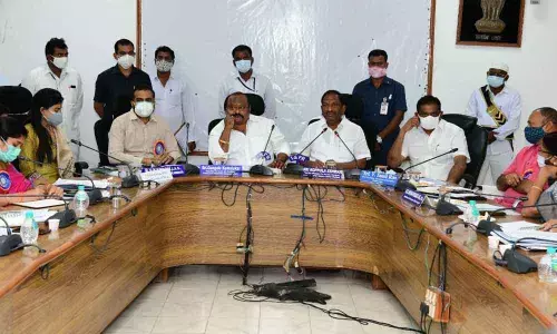 Minister K Eshwar speaking at a review meeting on Dalit Bandhu launching, in Karimnagar on Saturday