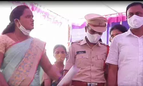 MPP Taduka Rani arguing with officials at a meeting in Kamalapur in Warangal Urban district on Saturday