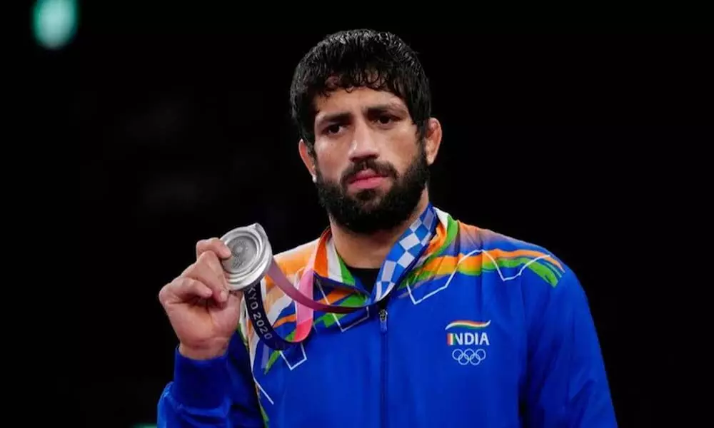 Ravi Kumar Dahiya won silver in Mens freestyle 57kg·Wrestling