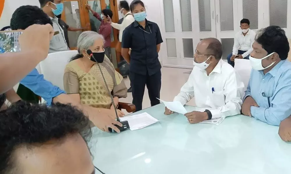 VDDUF leaders explaining various issues of SCs and STs to Finance Minister Nirmala Sitharaman in Visakhapatnam on Sunday