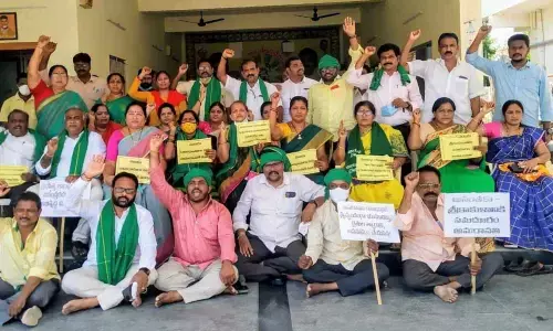 TDP leaders protesting in Ongole in support of the farmers and women agitating for the Capital Amaravati on Sunday