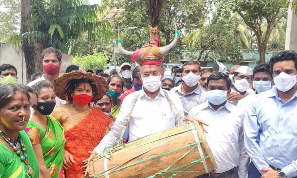 BC Welfare Minister Chelluboina Venu Gopala Krishna celebrating World Tribal Day in Rampachodavaram on Monday