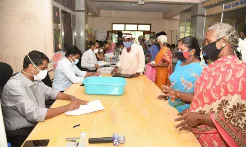 District Collector M Hari Narayanan receiving petitions at Spandana in Chittoor on Monday
