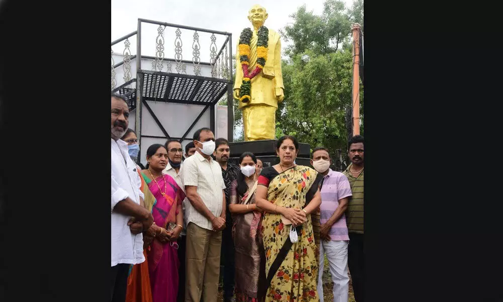 MLA Karunakar Reddy along with others at Sankarambadi statue in Tirupati on Tuesday