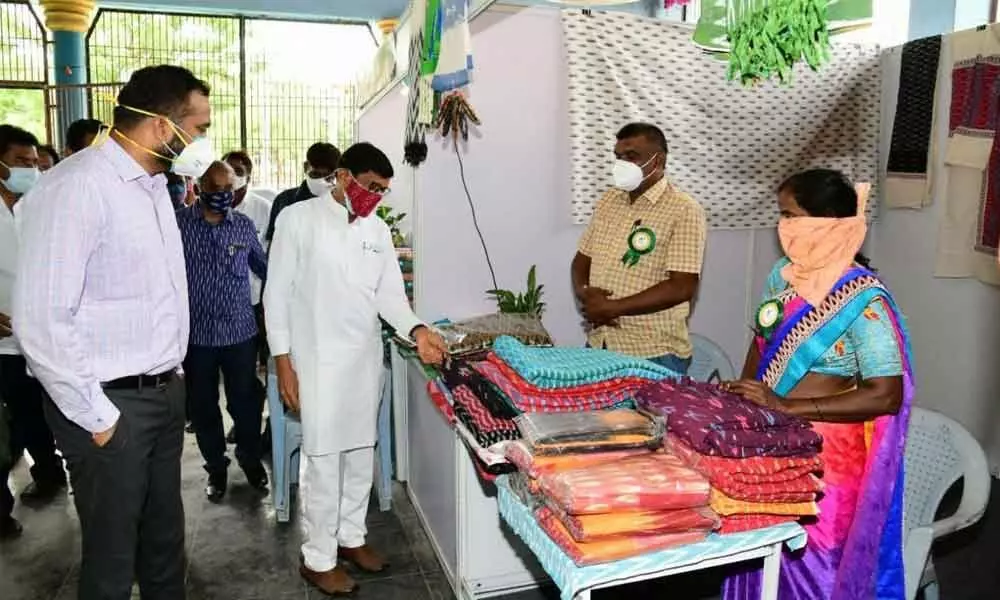 TSCAB Chairman Konduru Ravinder Rao inaugurating a two-day handlooms exhibition in Karimnagar on Tuesday