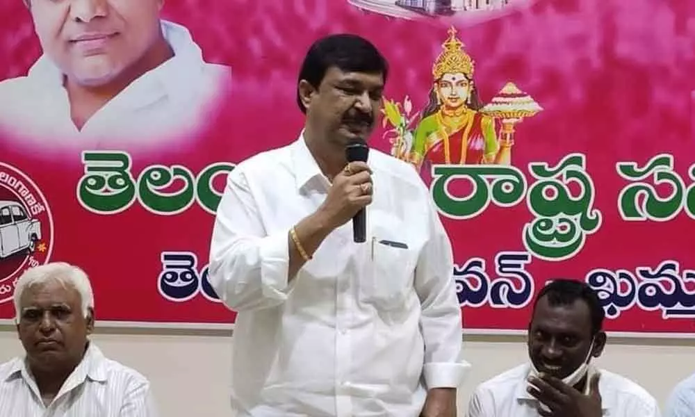 TRVKS district honorary president RJC Krishna speaking at a union meeting in Khammam on Tuesday