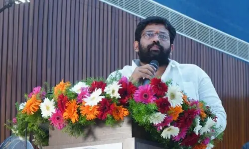 Rajanagaram MLA Jakkampudi Raja speaking at an awareness meeting on Disha app in Rajamahendravaram on Tuesday