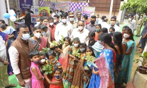 Nizamabad District Collector C Narayana Reddy along with the officials interacting with children at the Collectorate in Nizamabad on Tuesday