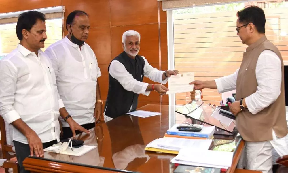 YSRCP MPs led by V Vijayasai Reddy submit a petition seeking constitutional amendments for speedy disposal of disqualifcation petitions, to Union Law and Justice Minister Kiren Rijiju in New Delhi on Wednesday