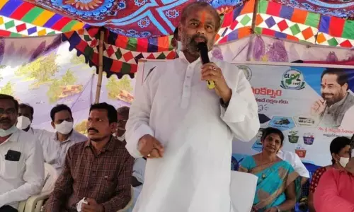 APLA Speaker T Sitaram addressing at the garbage bins distribution event in Amudalavalasa on Wednesday