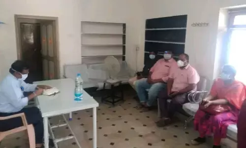 DMHO Dr B Rama Giddaiah holding a meeting with doctors of the mandal PHCs in Dhone on Thursday