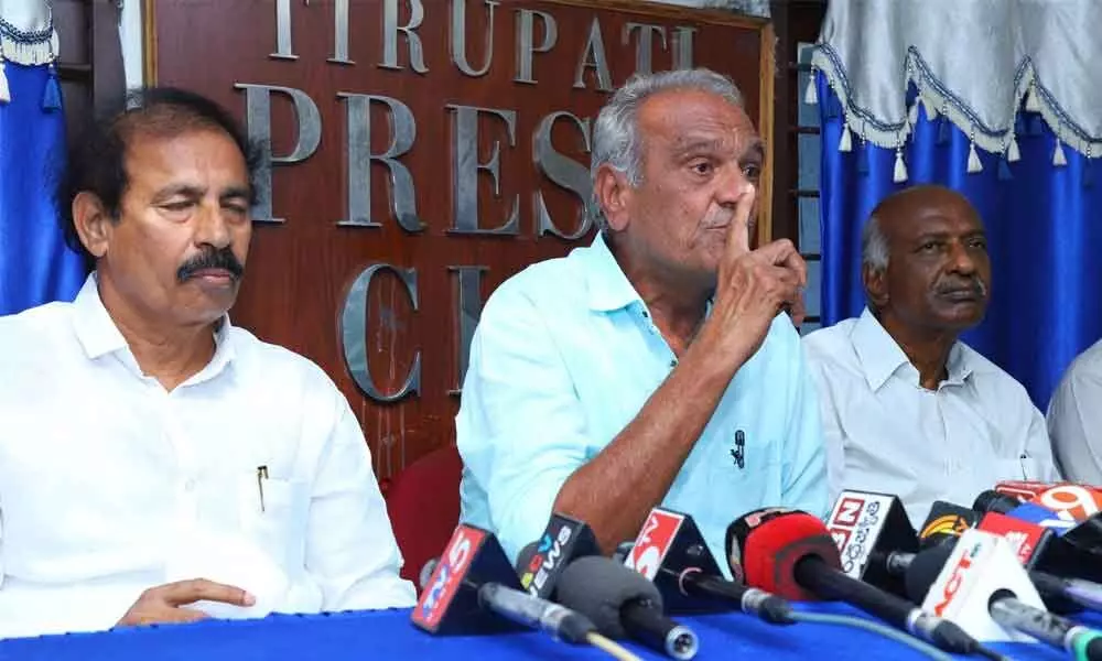 CPI national secretary K Narayana addresses the media at Press Club Tirupati in Tirupati on Saturday. Party state secretary  K Ramakrishna and others are also seen.