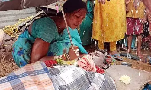 Man performs puja to bring dead back