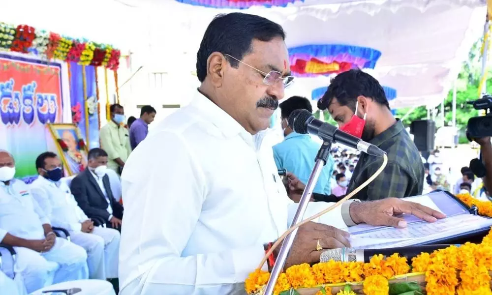 Minister for Panchayat Raj Errabelli Dayakar Rao addressing a gathering after hoisting national flag at the 75th Independence Day celebration