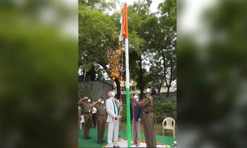 SBI Chief General Manager (Hyderabad circle) Amit Jhingran hoisting the national tricolor at the Koti office on the occasion of 75th Independence Day celebrations on Sunday