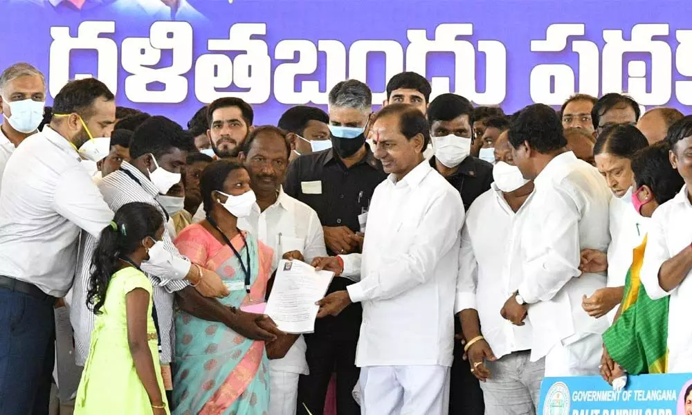 Chief Minister K Chandrashekar Rao launching the Dalit Bandhu scheme in Huzurabad on Monday