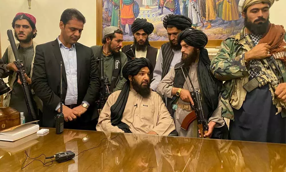 Taliban fighters take control of Afghan presidential palace after the Afghan President Ashraf Ghani fled the country, in Kabul, Afghanistan