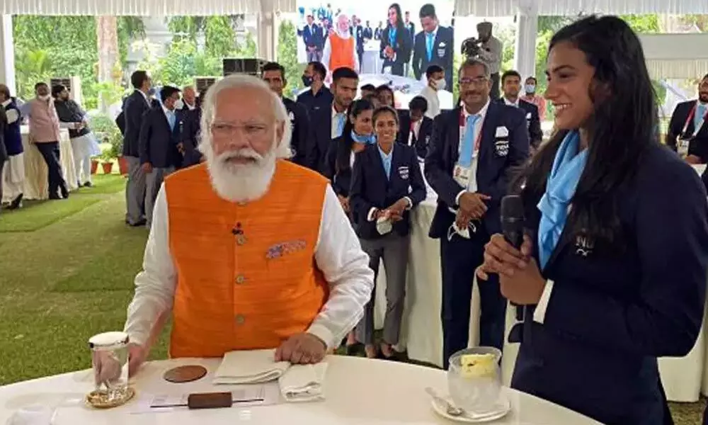 PM Modi having ice cream with ace shuttler PV Sindhu