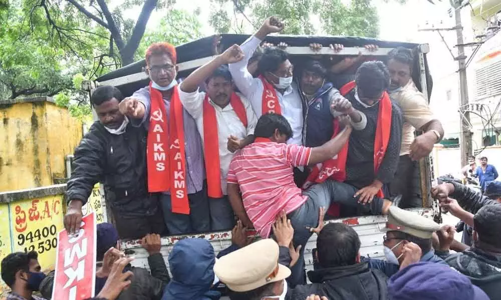 Police taking CPI (ML) leaders and activists into custody as they tried to lay siege to Transport Minister P Ajay Kumar’s camp office in Khammam on Monday