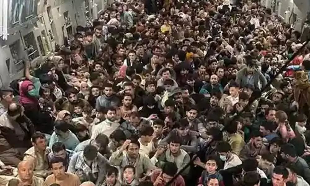 640 people fleeing Kabul in packed US military plane