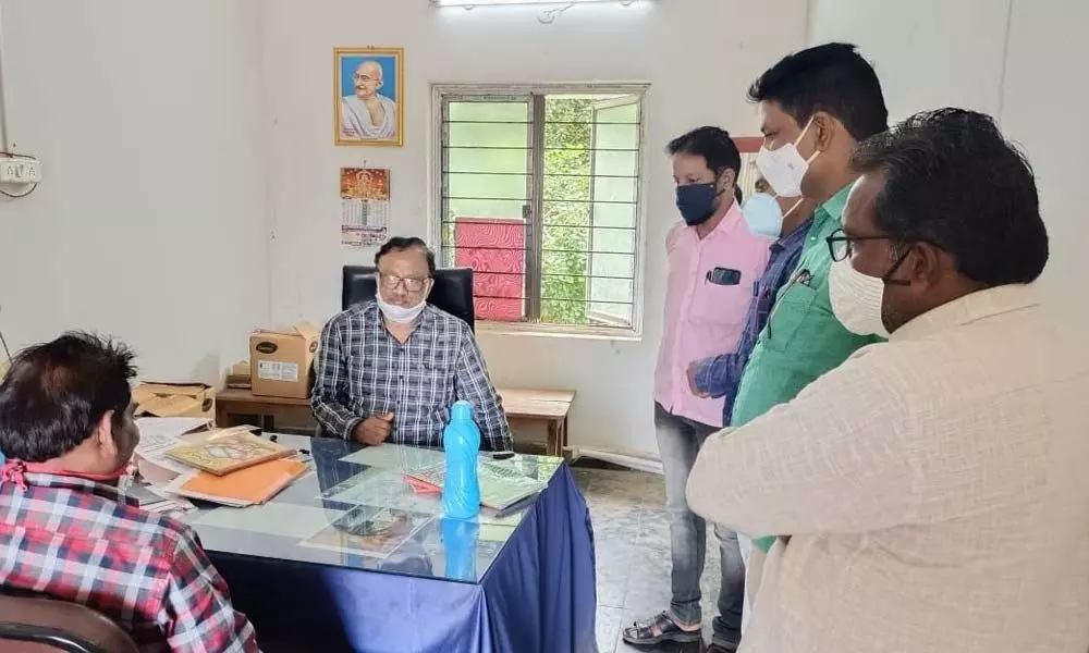 RIO VV Subbarao interacting with the staff at a Government Junior College in Singarayakonda on Tuesday