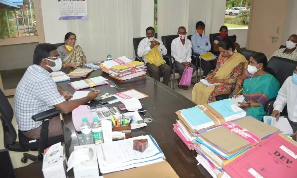 Hanumakonda District Collector Rajeev Gandhi Hanumanthu speaking at a review meeting in Hanumakonda on Wednesday