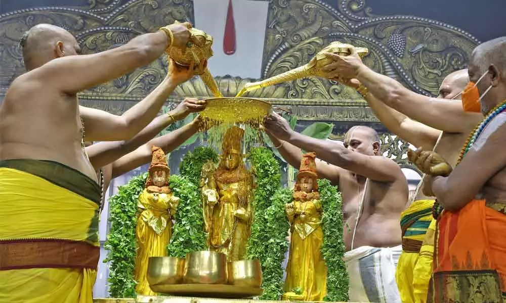 Preiests perform Snapana Tirumanjanam to deities as part of Pavitrotsavam at Tirumala on Wednesday